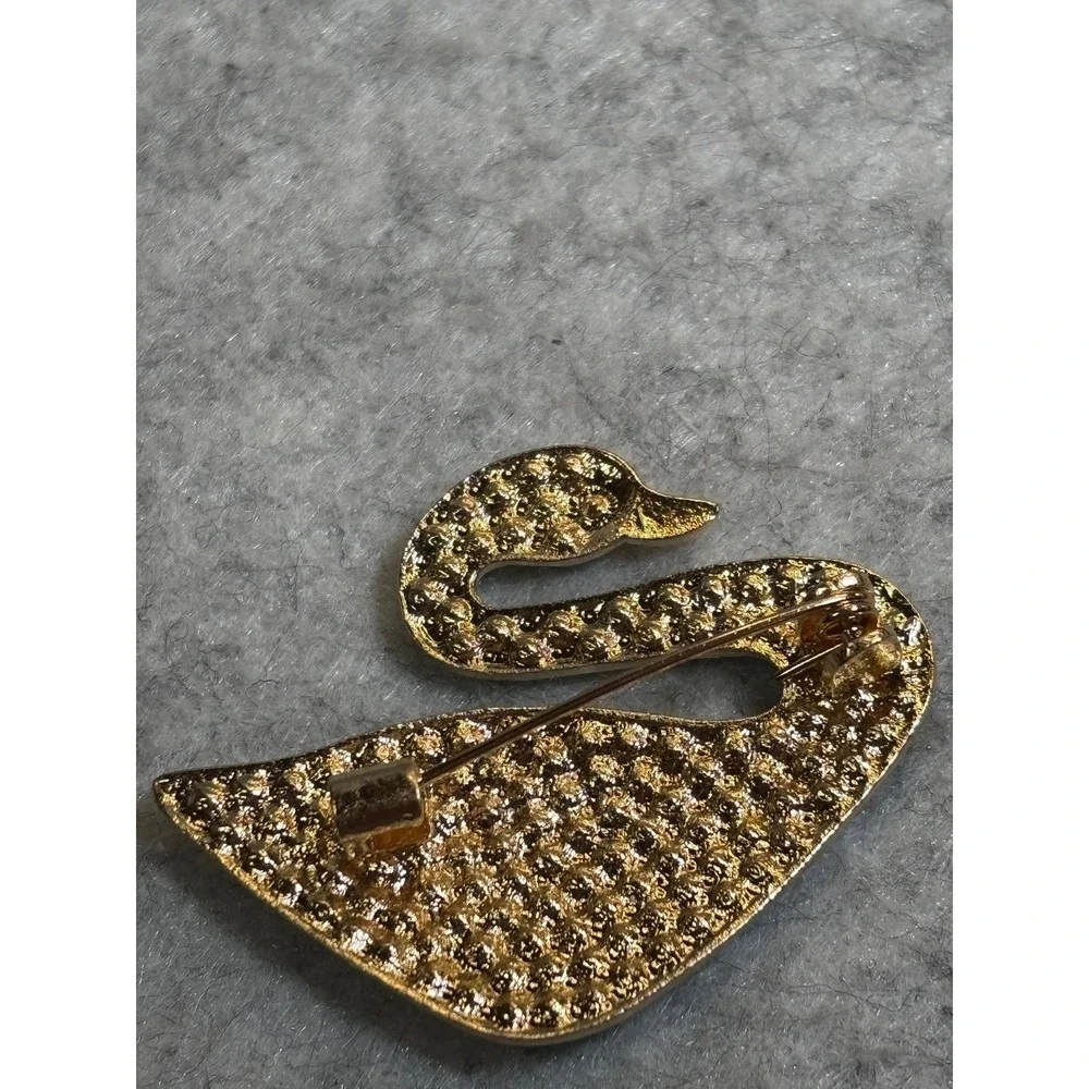 #79. Gold-tone Swan Brooch